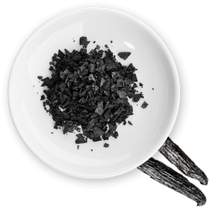 A plate of black sea salt grains A plate of black sea salt grains 11248002